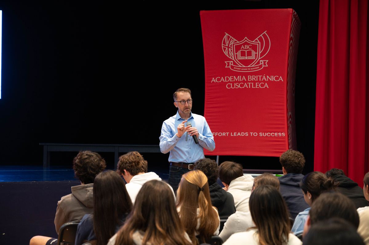 Chris speaking to students